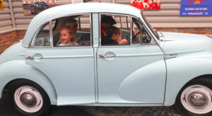 Visitors inside cars at We Had One of Those at Beaulieu 