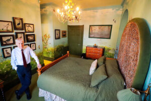 Lord Montagu in the Meadow room of Palace House, Beaulieu 