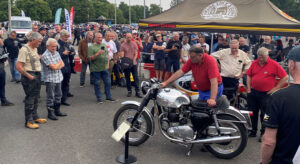 National Motor Museum collection motorbike being started up at Beaulieu Bikers' Day