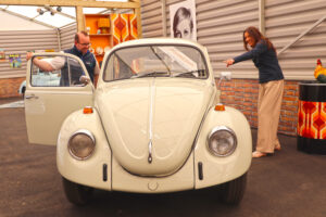 Visitors with the VW Beetle in Beaulieu's new attraction We Had One of Those