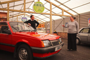 Visitors with Vauxhall Cavalier in Beaulieu's new We Had One of Those attraction